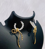 TweeDorbs Bow Pearl Earrings